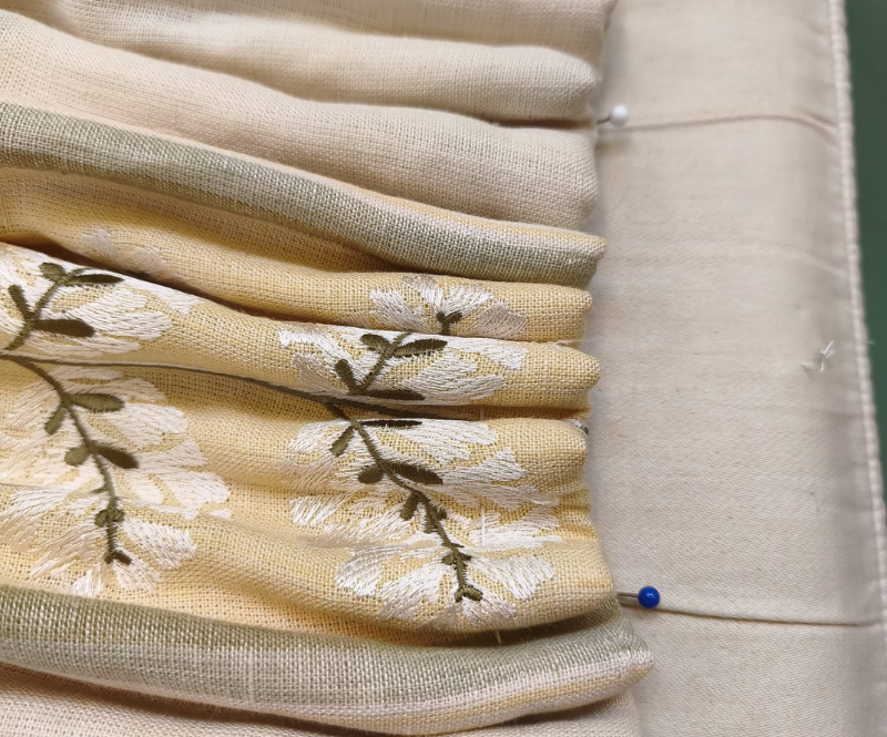 Pleats gathered up evenly Pleats gathered up evenly